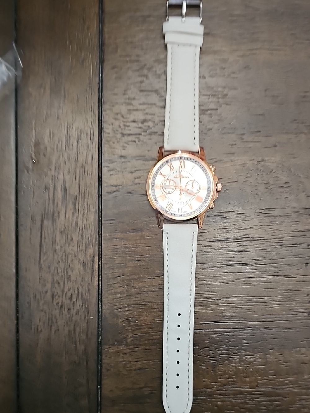 New. Battery Included in Watch. Women's White Strap Watch with Rose Gold Case